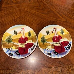 A Set of 2 vintage Italian hand painted dipping bowls.